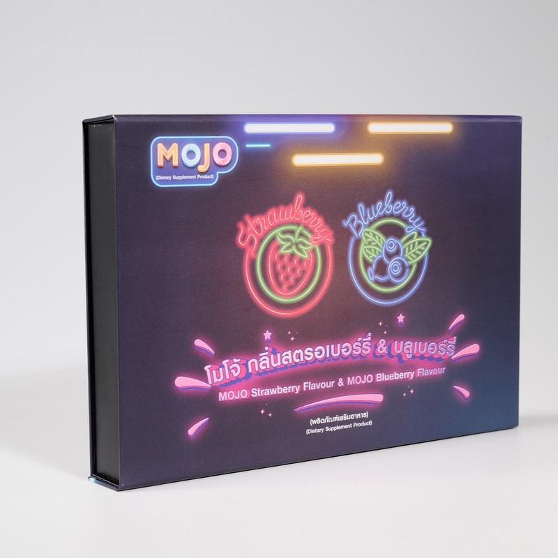 MOJO product packaging with strawberry and blueberry graphics on a dark background